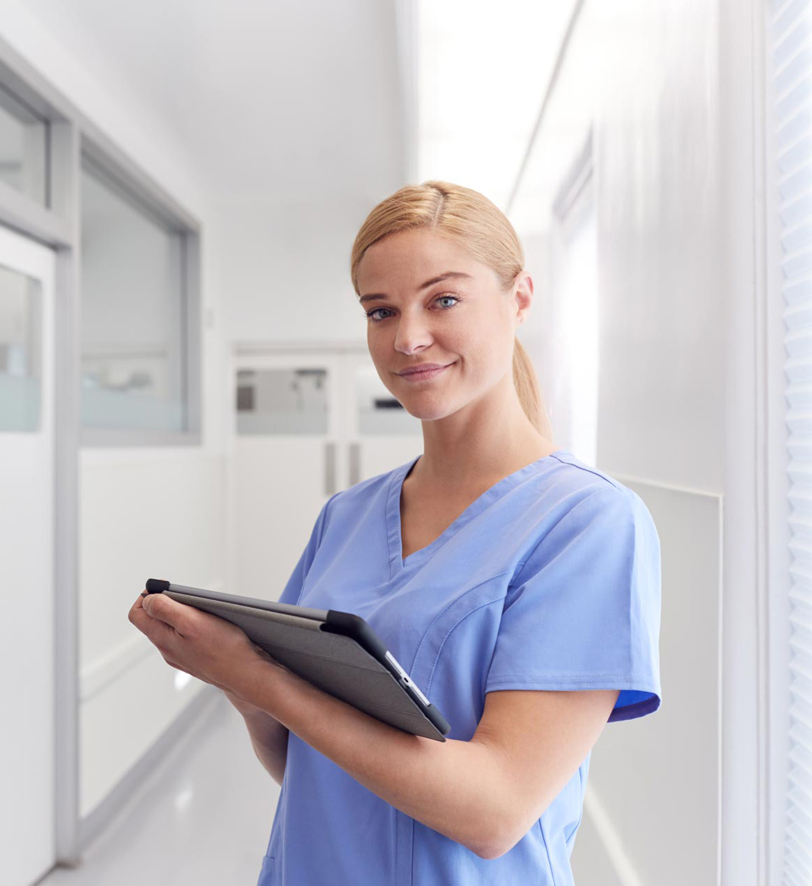 portrait-of-smiling-female-doctor-wearing-scrubs-EYSJKTB-1.jpg portrait-of-smiling-female-doctor-wearing-scrubs-EYSJKTB-1.jpg